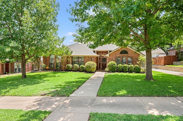 3907 Meadow Dr, Grapevine, TX 76051 - view of front of home with brick siding and roof with shingles