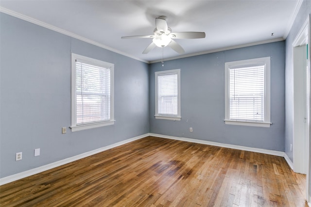 202 N St, Grand Prairie, TX 75050 - unfurnished room with wood-type flooring, healthy amount of natural light, ceiling fan, and ornamental molding