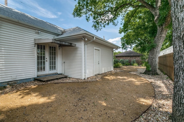 202 N St, Grand Prairie, TX 75050 - rear view of house featuring french doors