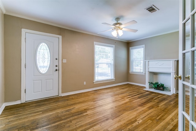 202 N St, Grand Prairie, TX 75050 - foyer entrance featuring hardwood / wood-style flooring, crown molding, and ceiling fan