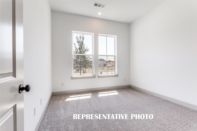 5609 Golden Sun Ln, Mckinney, TX 75070 - carpeted spare room with baseboards
