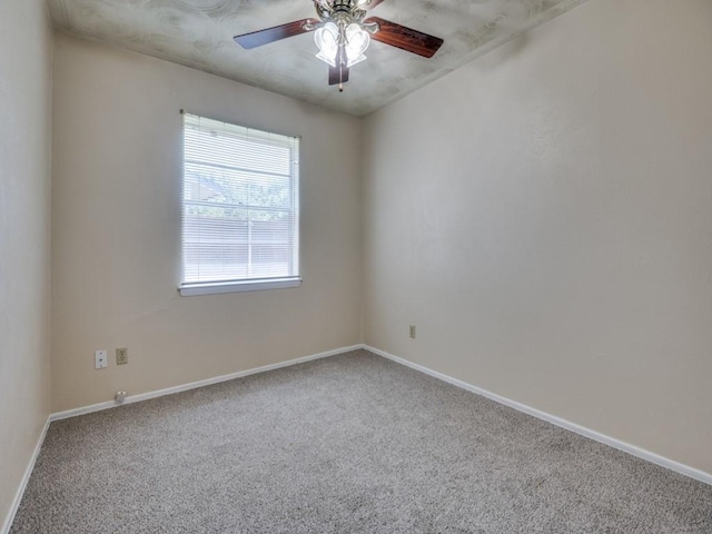 2504 W Rochelle Rd, Irving, TX 75062 - unfurnished room with carpet, baseboards, and ceiling fan