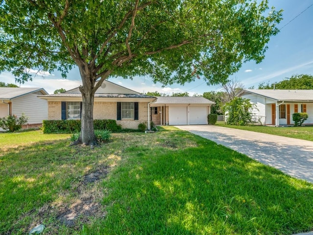 2504 W Rochelle Rd, Irving, TX 75062 - single story home with a garage, driveway, a front yard, and brick siding