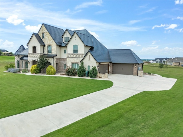 212 Nueces Trl, Aledo, TX 76008 - french provincial home featuring stucco siding, stone siding, an attached garage, driveway, and a front lawn