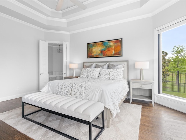 212 Nueces Trl, Aledo, TX 76008 - bedroom featuring a tray ceiling, wood finished floors, crown molding, baseboards, and a ceiling fan