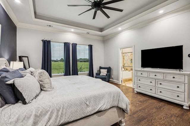 872 Hidden Pass, Royse City, TX 75189 - bedroom with a tray ceiling, dark wood-type flooring, ornamental molding, ensuite bathroom, and recessed lighting