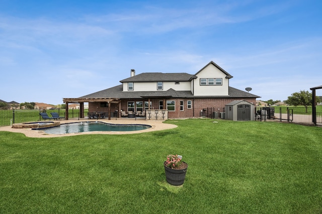 872 Hidden Pass, Royse City, TX 75189 - back of property featuring a storage unit, a fenced backyard, a patio area, a pool with connected hot tub, and brick siding