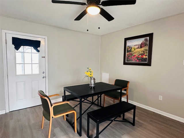 3007 Gaines St, Bossier City, LA 71111 - dining room with wood finished floors, baseboards, and a ceiling fan