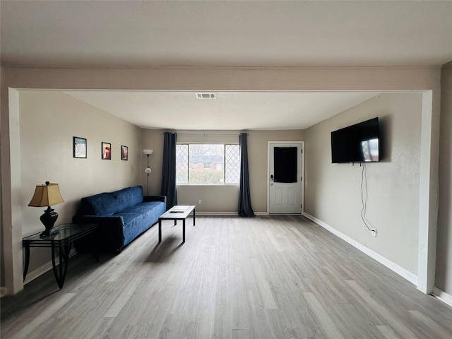 3007 Gaines St, Bossier City, LA 71111 - living area featuring light wood-style flooring and baseboards
