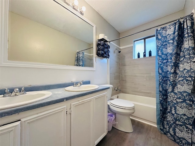 3007 Gaines St, Bossier City, LA 71111 - bathroom with double vanity, wood finished floors, shower / bath combination with curtain, and toilet