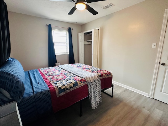 3007 Gaines St, Bossier City, LA 71111 - bedroom with wood finished floors, ceiling fan, baseboards, and a closet