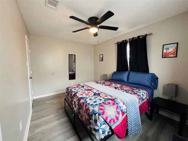 3007 Gaines St, Bossier City, LA 71111 - bedroom featuring wood finished floors, baseboards, and ceiling fan