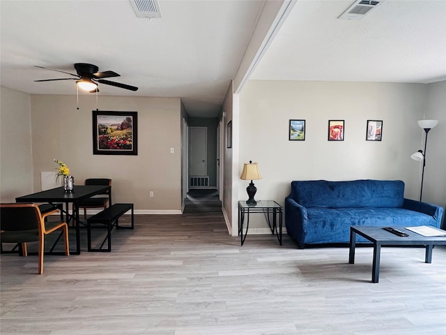 3007 Gaines St, Bossier City, LA 71111 - living area with light wood finished floors, ceiling fan, and baseboards