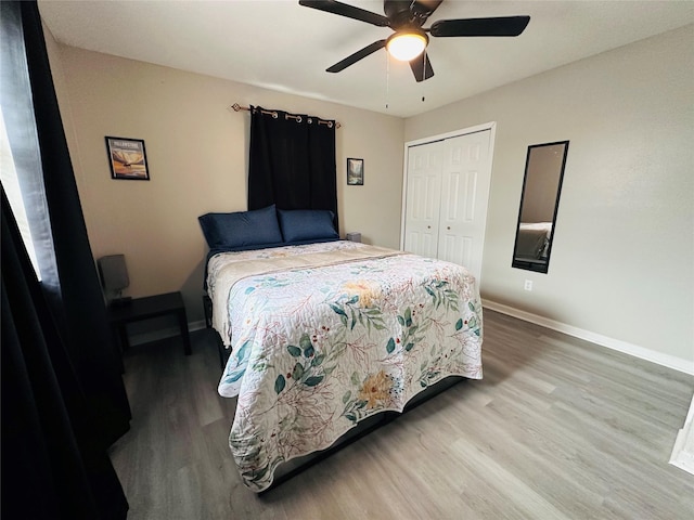 3007 Gaines St, Bossier City, LA 71111 - bedroom featuring wood finished floors, a closet, baseboards, and ceiling fan
