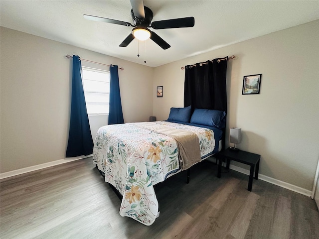 3007 Gaines St, Bossier City, LA 71111 - bedroom featuring wood finished floors, baseboards, and a ceiling fan