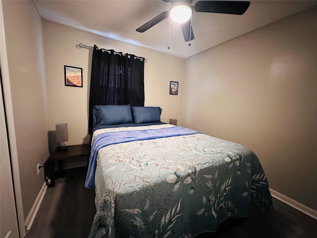 3007 Gaines St, Bossier City, LA 71111 - bedroom with wood finished floors, baseboards, and a ceiling fan