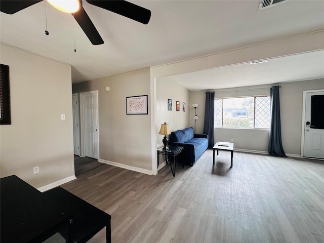 3007 Gaines St, Bossier City, LA 71111 - living area featuring wood finished floors, baseboards, and ceiling fan
