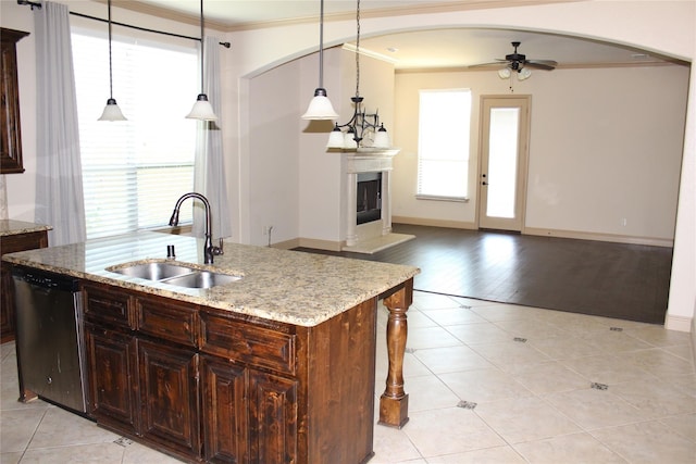 16324 Toledo Bend Ct, Prosper, TX 75078 - kitchen featuring stainless steel dishwasher, a sink, crown molding, a ceiling fan, and open floor plan