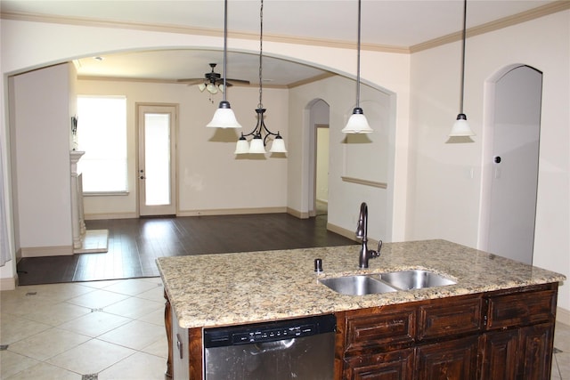 16324 Toledo Bend Ct, Prosper, TX 75078 - kitchen featuring a sink, dishwasher, ceiling fan, ornamental molding, and arched walkways
