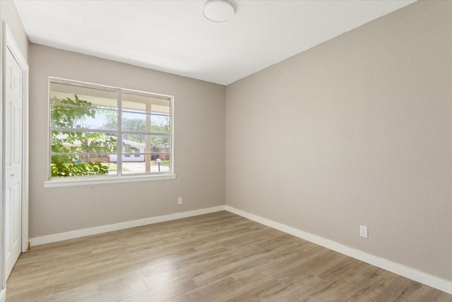 311 S Barbara, Waco, TX 76705 - spare room featuring light wood-style flooring and baseboards