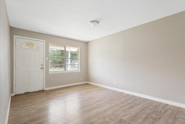 311 S Barbara, Waco, TX 76705 - foyer with light wood-type flooring and baseboards