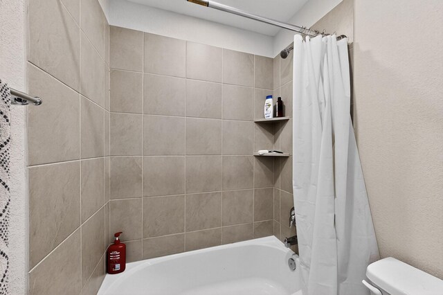 403 Pendant Dr, Royse City, TX 75189 - full bathroom featuring shower / bath combination with curtain and toilet