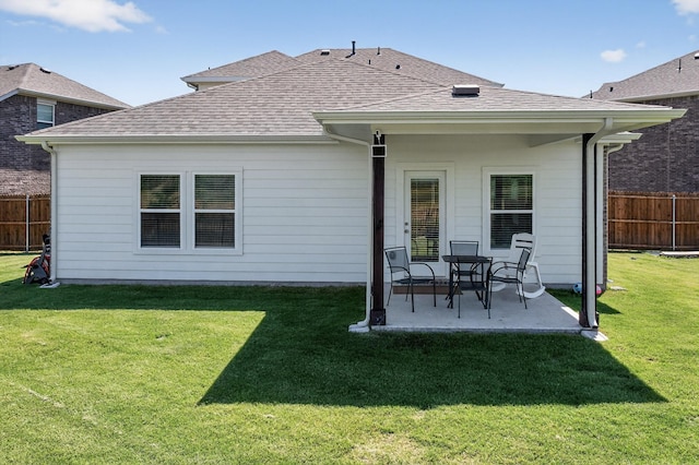 403 Pendant Dr, Royse City, TX 75189 - rear view of house with a patio area and roof with shingles