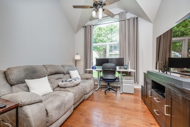 1200 Stonehedge Pl, Flower Mound, TX 75028 - home office with lofted ceiling, a ceiling fan, and light wood-type flooring