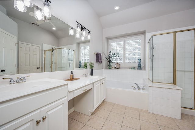 1200 Stonehedge Pl, Flower Mound, TX 75028 - bathroom featuring vaulted ceiling, a shower stall, double vanity, tile patterned flooring, and a garden tub