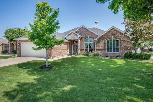 1200 Stonehedge Pl, Flower Mound, TX 75028 - view of front of house featuring a garage, driveway, a chimney, a front yard, and brick siding