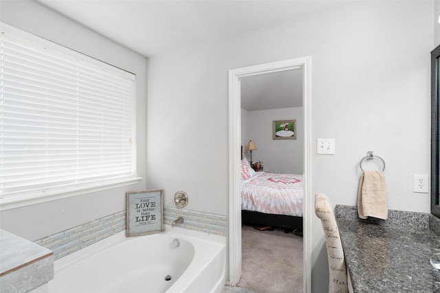 303 Highland Glen Dr, Wylie, TX 75098 - bathroom featuring a bath, ensuite bath, and vanity