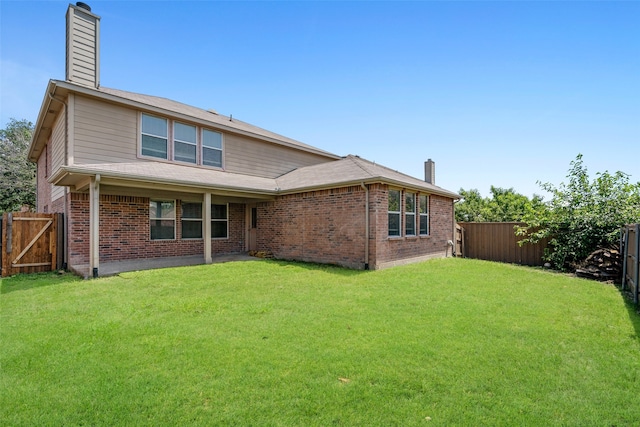 303 Highland Glen Dr, Wylie, TX 75098 - back of house featuring a chimney and brick siding