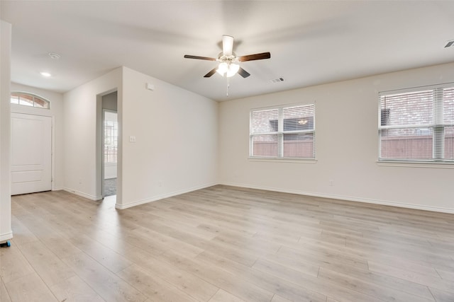 2705 Hancock Ln, Celina, TX 75009 - spare room featuring plenty of natural light, ceiling fan, and light wood-style flooring