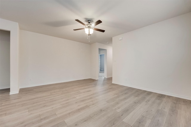 2705 Hancock Ln, Celina, TX 75009 - empty room with a ceiling fan, light wood-type flooring, and baseboards