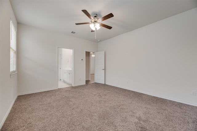 2705 Hancock Ln, Celina, TX 75009 - unfurnished bedroom with light colored carpet, baseboards, a ceiling fan, and connected bathroom