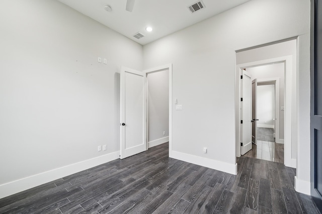 2522 Hardwick Ln, Cedar Hill, TX 75104 - unfurnished bedroom featuring dark wood-type flooring and baseboards