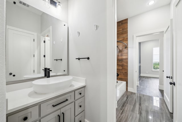2522 Hardwick Ln, Cedar Hill, TX 75104 - full bathroom featuring vanity, baseboards, bathtub / shower combination, and recessed lighting