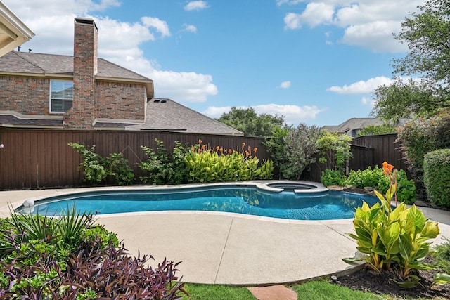 600 Harrison Hill Ct, Coppell, TX 75019 - view of swimming pool featuring a fenced backyard, a patio area, and a pool with connected hot tub