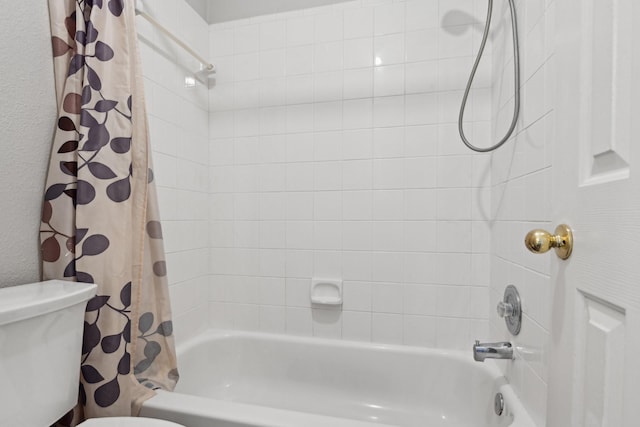 600 Harrison Hill Ct, Coppell, TX 75019 - bathroom featuring toilet and shower / tub combo with curtain