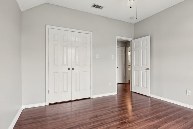 600 Harrison Hill Ct, Coppell, TX 75019 - unfurnished bedroom featuring dark wood-type flooring, baseboards, and a closet