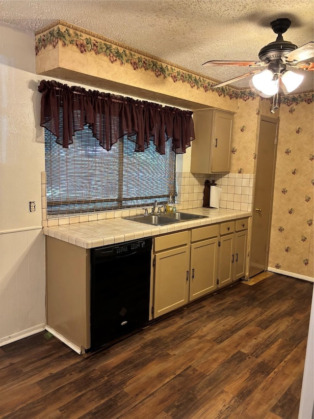 621 Lynnewood Ave, Burleson, TX 76028 - kitchen featuring black dishwasher, dark wood-style flooring, ceiling fan, a sink, and a textured ceiling