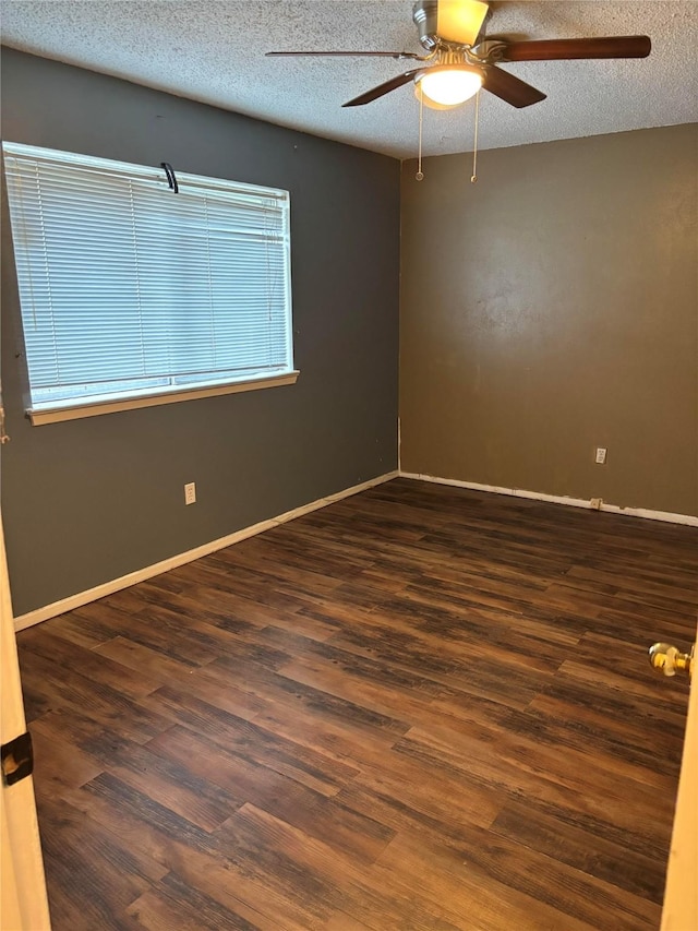 621 Lynnewood Ave, Burleson, TX 76028 - empty room featuring wood finished floors, a ceiling fan, a textured ceiling, and baseboards