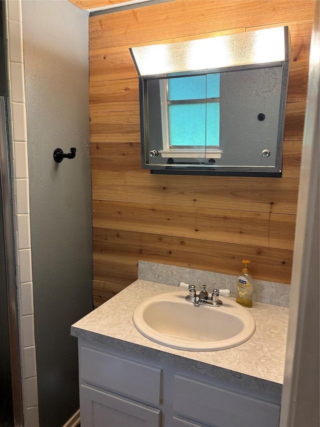 621 Lynnewood Ave, Burleson, TX 76028 - bathroom with vanity and wooden walls