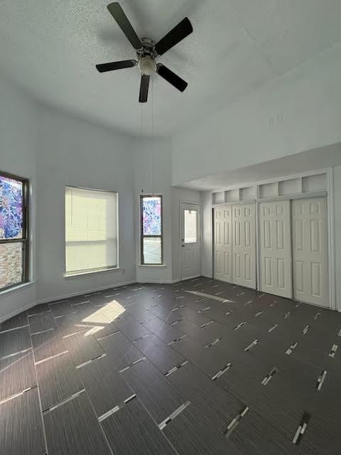 3404 W Country Club Dr Unit 264, Irving, TX 75038 - unfurnished bedroom with ceiling fan