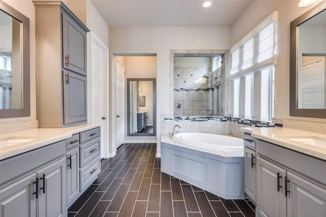 3900 Silent Water St, Mckinney, TX 75071 - full bathroom featuring healthy amount of natural light, two vanities, a shower stall, and recessed lighting