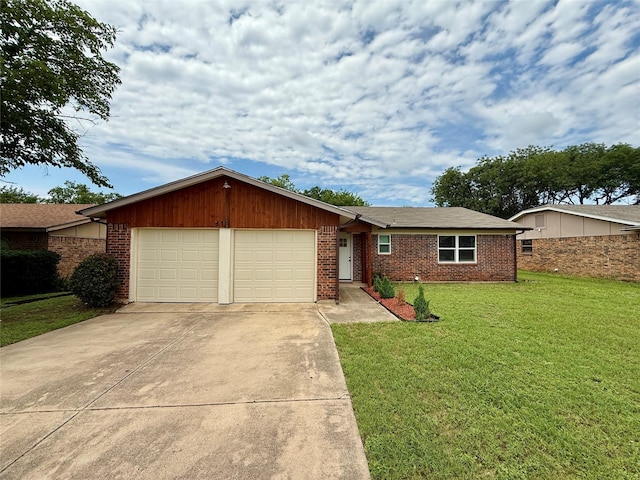 517 Gristmill Ln, Everman, TX 76140 - ranch-style house with an attached garage, brick siding, concrete driveway, and a front lawn