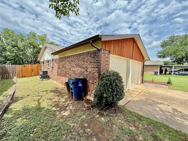 517 Gristmill Ln, Everman, TX 76140 - view of side of home featuring brick siding and driveway