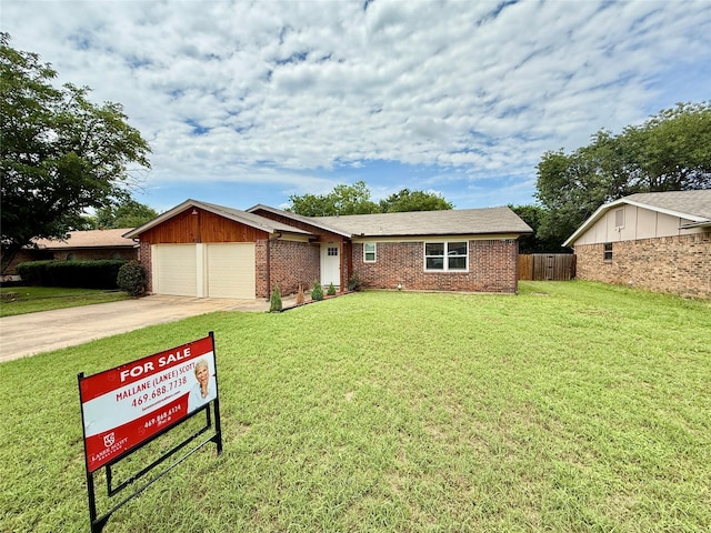 517 Gristmill Ln, Everman, TX 76140 - ranch-style house featuring a garage, brick siding, and concrete driveway