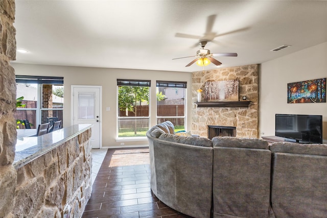 3028 Maple Creek Dr, Fort Worth, TX 76177 - living area with a fireplace, healthy amount of natural light, ceiling fan, and wood finished floors