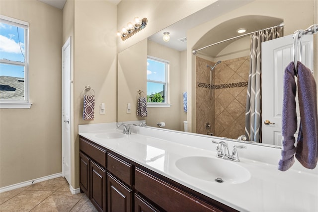 3028 Maple Creek Dr, Fort Worth, TX 76177 - bathroom featuring double vanity, toilet, baseboards, tile patterned flooring, and shower / tub combo